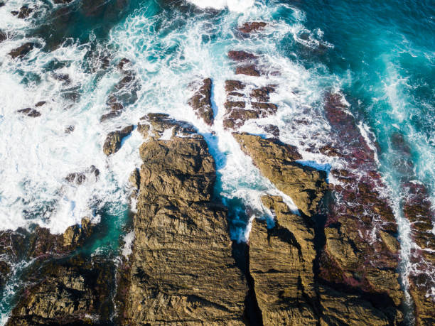 istock Looking directly down on a rocky coastline, NSW Australia 1276531871