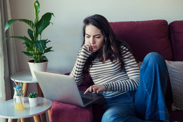 istock Young adult studying and working from home during Covid-19 1276534796