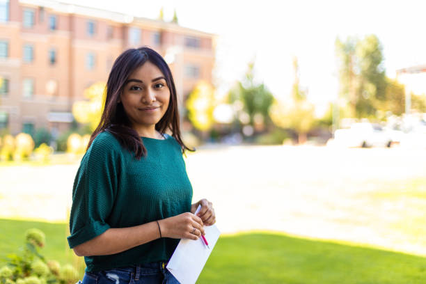 Generation Z Hispanic Female Voter with Mail-in Voting Election Ballot in Western USA Photo series - foto de stock