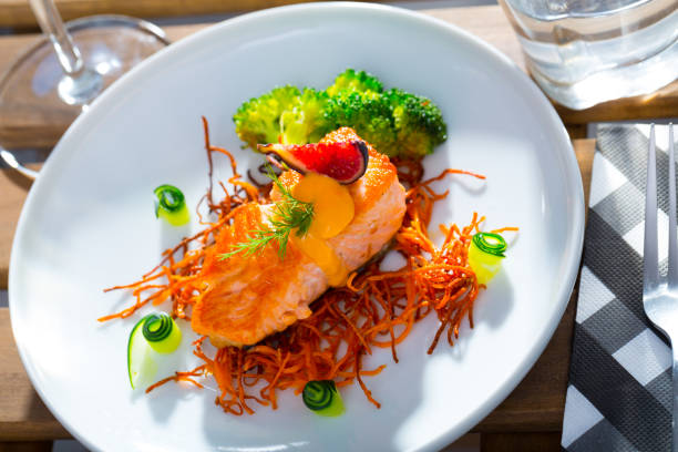 istock Grilled salmon on smoked carrots 1276540003