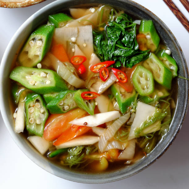 sour vegetables soup bowl for vegan meal, vegetarian eating good for healthy for diet - indochina soup flag national flag imagens e fotografias de stock