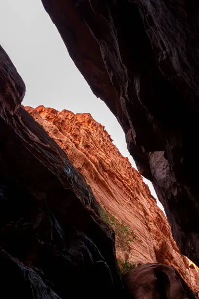 Photo of Image of the Khazali canyon, a narrow passage between gigantic red sandstone rocks in Wadi Rum, Jordan