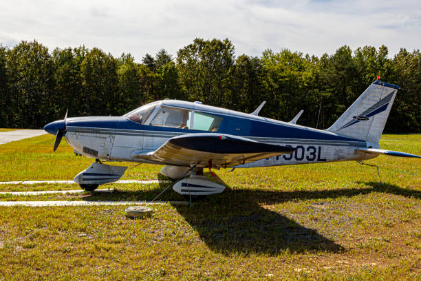 (Piper Cherokee PA 28) parked on the lawn at Maryland Airport (2W5) stock photo