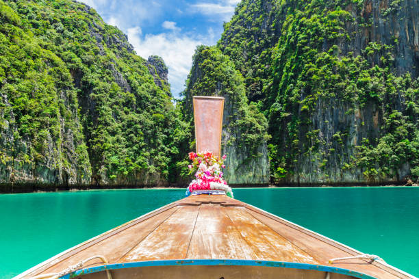 istock Traditional longtail boat with beautiful scenery view Phi Phi island at Thailand 1276549348