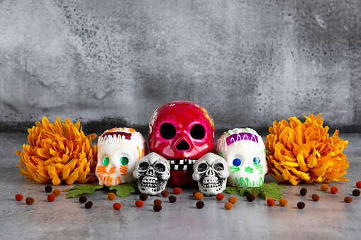 Day of the dead traditional Mexican skulls arrangement with space for copy