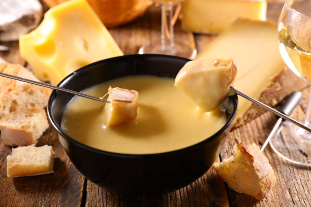 Swiss cheese fondue on dining table