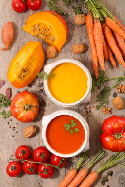 istock carrot, pumpkin and tomato soup 1276561889
