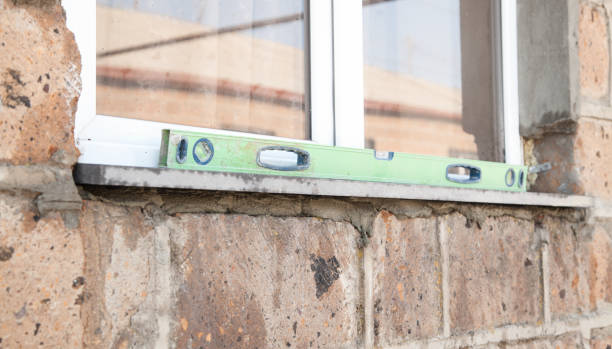 istock Level on window in outdoor. Repairing 1276562827