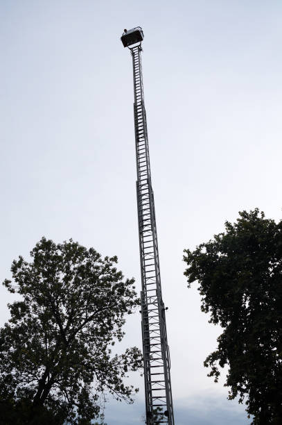 istock retractable fire stairs on the background of trees close up 1276563799