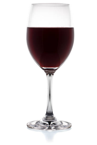 istock Red wine in a glass isolated on white background 1276564159