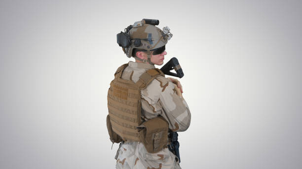 istock Fully Equipped Solder Holding Assault Rifle and Standing looking 1276564738