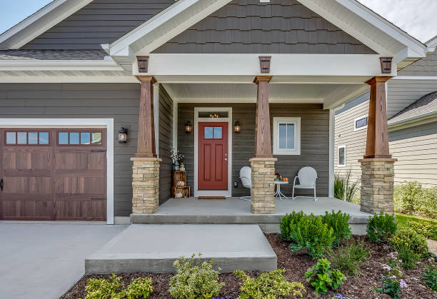 istock Three support columns on front porch of home 1276569334