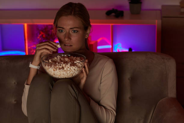 istock Watching movie with popcorn 1276569628