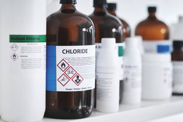 Common lab chemicals Shot of bottles of chemicals on a shelf in a lab brics photos stock pictures, royalty-free photos & images