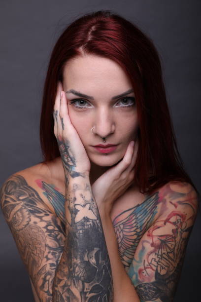 istock Girl with tattoos 1276572604