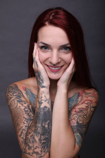 istock Girl with tattoos 1276572609