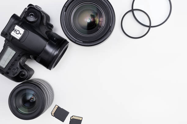 istock photography equipment and copy space over white table 1276573954