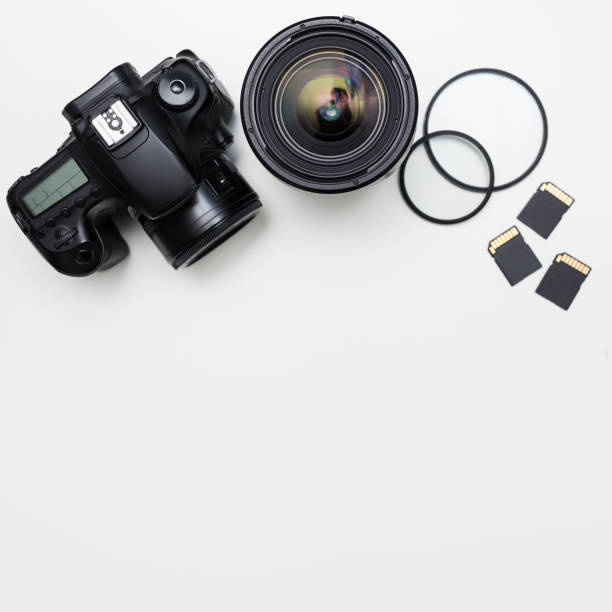 istock photography equipment and copy space over white table 1276574001