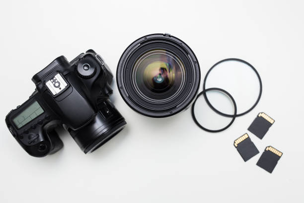 istock modern photography equipment over white table 1276574003