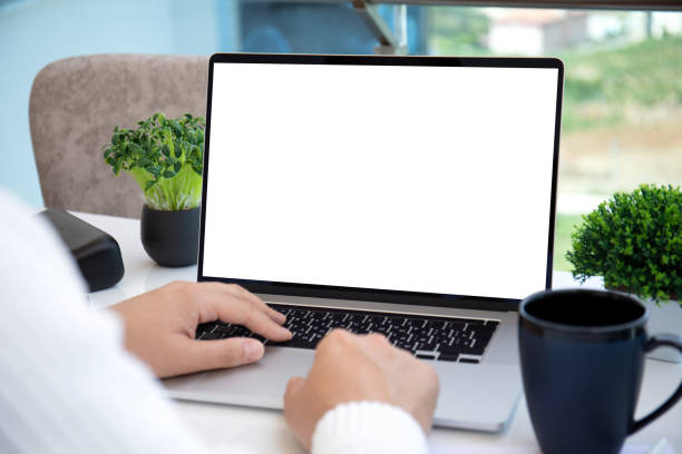 istock male hands on laptop keyboard with isolated screen in office 1276574167