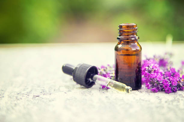 istock Lavender essential oil in a small bottle. Selective focus. 1276576756