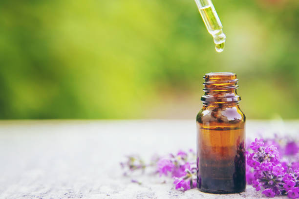 istock Lavender essential oil in a small bottle. Selective focus. 1276576760