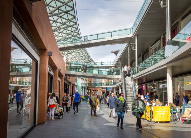 Liverpool, England - 3 April, 2017: People walking in the Liverpool center. The place is the largest open air shopping centre in the United Kingdom and the 5th largest overall.
