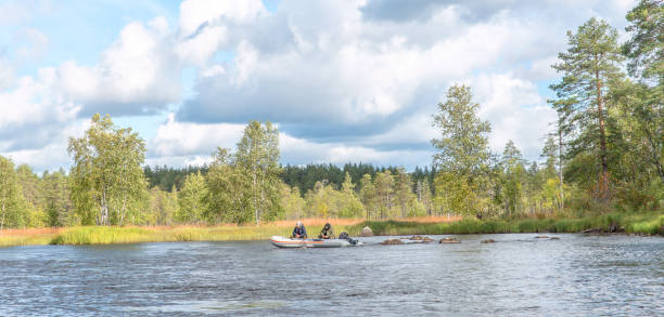 istock Two men in a boat fishing. 1276580670