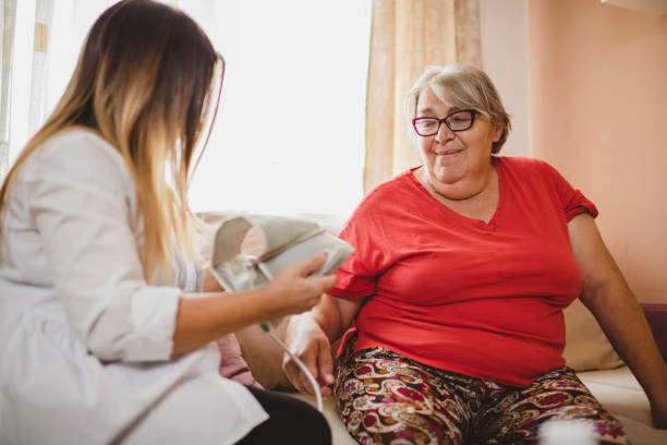 istock Healthcare worker at home visit 1276581843