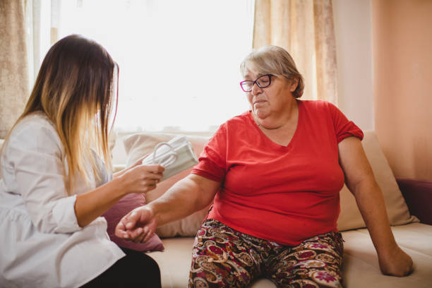istock District nurse at home visit 1276582052