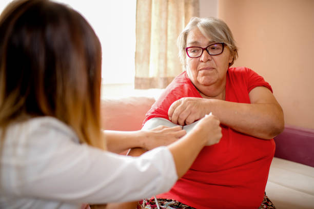 istock Healthcare worker at home visit 1276582269