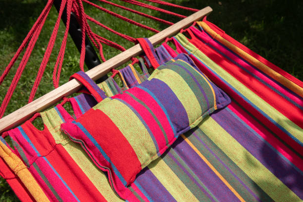 istock empty hammock in a green bright garden. 1276583118
