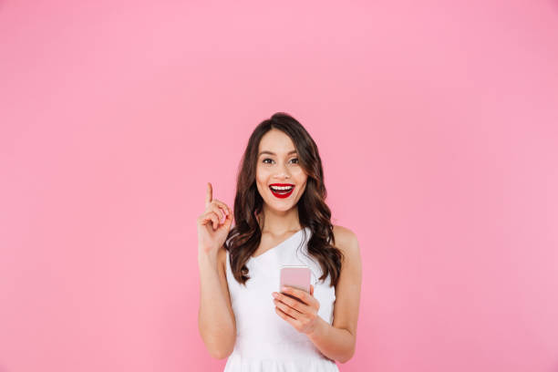 istock Cheerful young asian woman have an idea using mobile phone. 1276583467