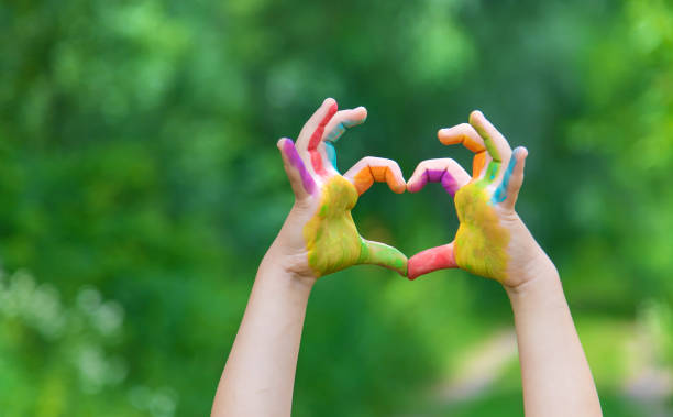 istock Children's hands in the colors of summer. Selective focus. 1276584832