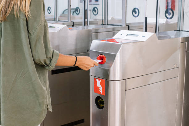 istock Crop woman paying for ticket on station 1276585017
