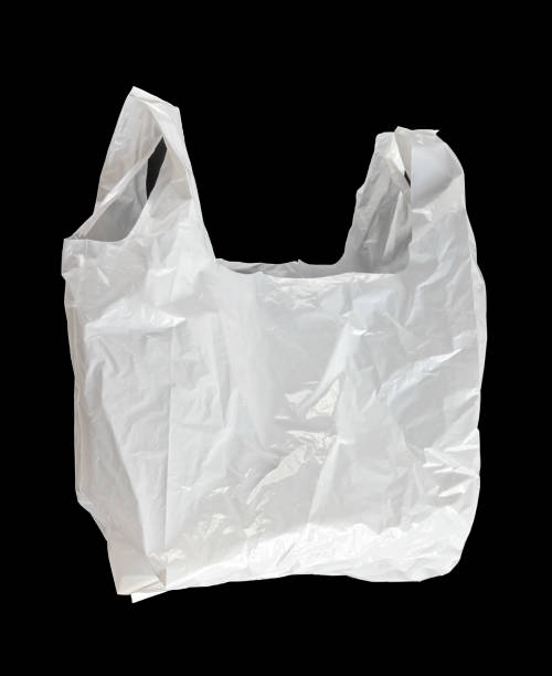 istock White plastic bag isolated on black background 1276585619