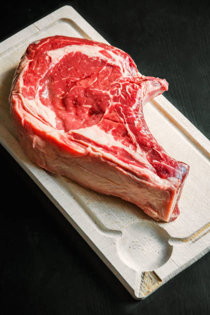 istock Beef prime rib on a cutting board 1276585693