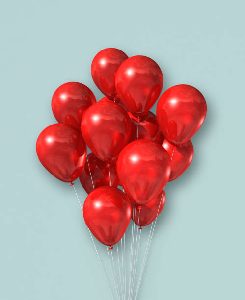 istock Red air balloons group on a light blue background 1276585936
