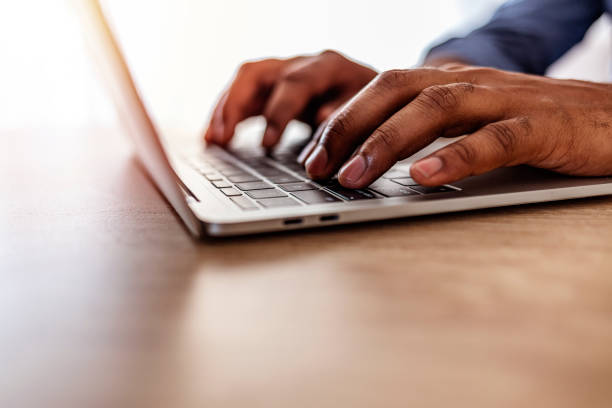 istock Close Up Of Man Typing On Laptop 1276586081