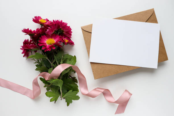 istock greeting card design. burgundy chrysanthemums and an envelope 1276586343
