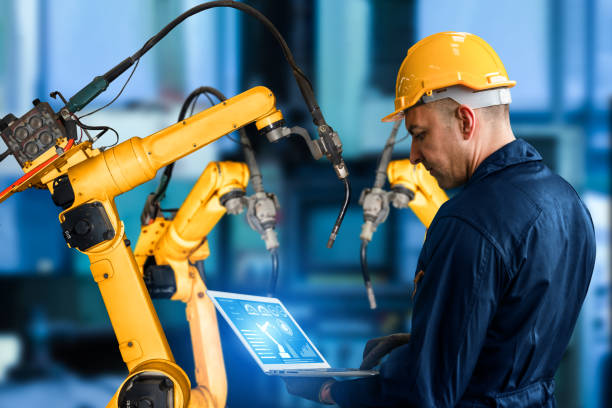 istock Smart industry robot arms for digital factory production technology 1276589320