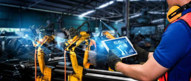 istock Smart industry robot arms for digital factory production technology 1276589327