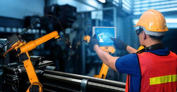 istock Smart industry robot arms for digital factory production technology 1276589336