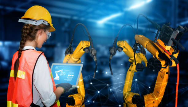 istock Smart industry robot arms for digital factory production technology 1276589399