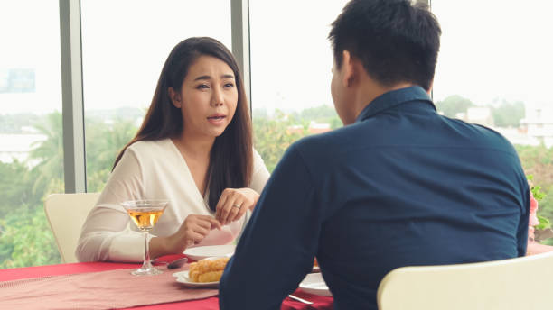istock Happy romantic couple eating lunch at restaurant 1276590206