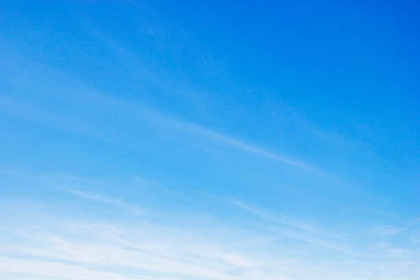 istock Blue sky background and white clouds soft focus, and copy space 1276592746