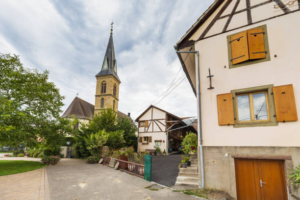 istock View on Eglise de Magstatt-le-Bas and timber framing house 1276593402