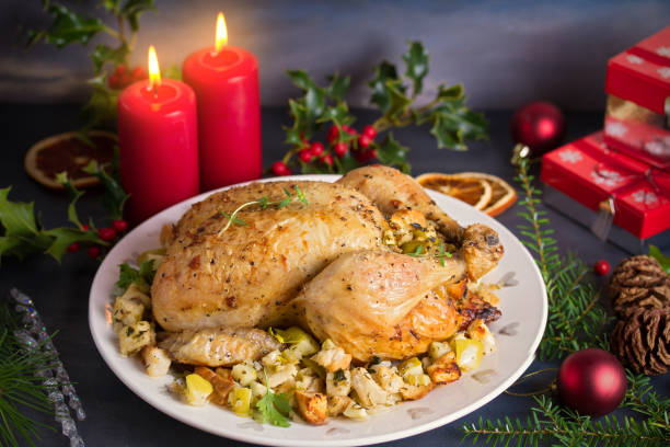 istock Roasted chicken stuffed with apple bread and celery. Christmas Thanksgiving dinner 1276596002