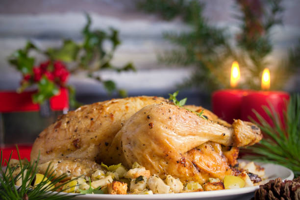 istock Roasted chicken stuffed with apple bread and celery. Christmas Thanksgiving dinner 1276596017