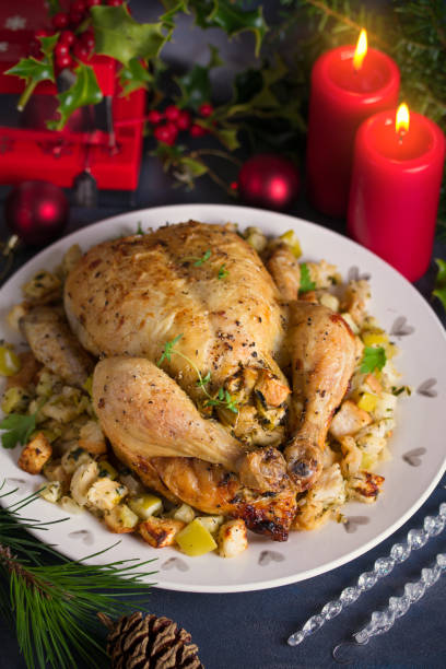 istock Roasted chicken stuffed with apple bread and celery. Christmas Thanksgiving dinner 1276596024